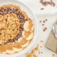 Peanut Butter Cup Protein Bowl · Peanut butter, banana, cacao powder, chocolate protein powder, almond milk, granola, coconut...