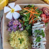 Grilled Ahi Tuna · Grilled Fresh Ahi Fish.Topped with Homemade Cliatro Lime sauce YUMMY. Serve with garlic butt...