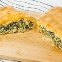 Spanakopita · Vegetarian.  Spinach and feta wrapped in phyllo dough.