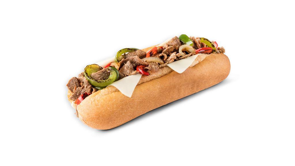 9In Steak Bomb · Shaved steak with roasted red and green peppers, yellow onions and white American cheese.