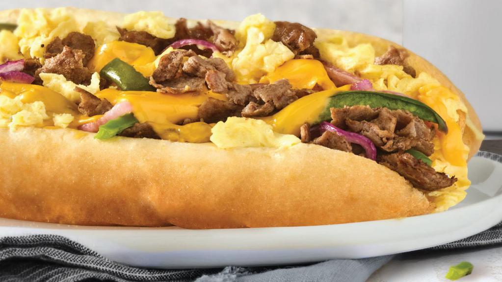 Breakfast Cheesesteak · Steak Roll Scrambled Egg, Roasted Peppers, Grilled Onions & American Cheese