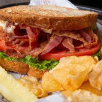 Blt Sandwich · Bacon, lettuce and tomato with mayo served with pickle and chips. Multi-grain toast.