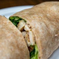 Grilled Chicken Caesar Wrap · Grilled chicken breast, Asiago cheese, lettuce, caesar dressing, and tomatoes. Served with p...