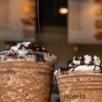 Frozen Mocha · Frozen and blended made with real espresso and mocha sauce. Topped with whipped cream and mo...