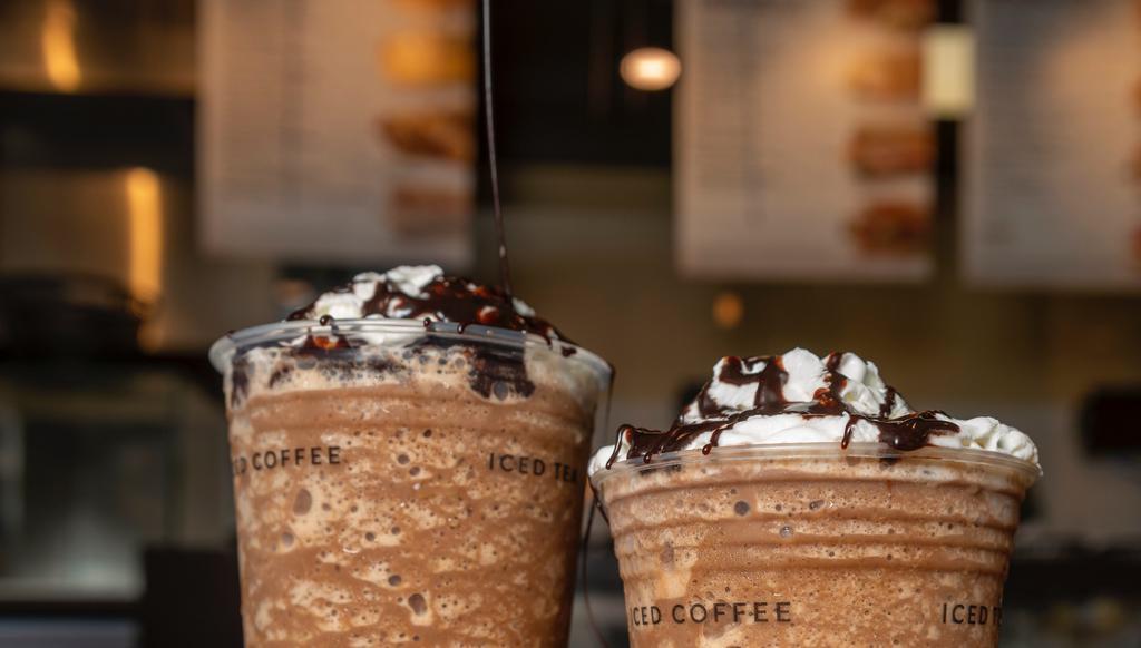 Frozen Mocha · Frozen and blended made with real espresso and mocha sauce. Topped with whipped cream and mocha.