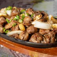 Garlic Ttongzip · Stir-fried chicken GIZZARD(organs) cooked in sesame oil sauce with garlic