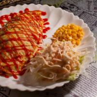 Omelet Rice · Stir vegetable fried rice with ketchup, and wrapped in a thin sheet of egg