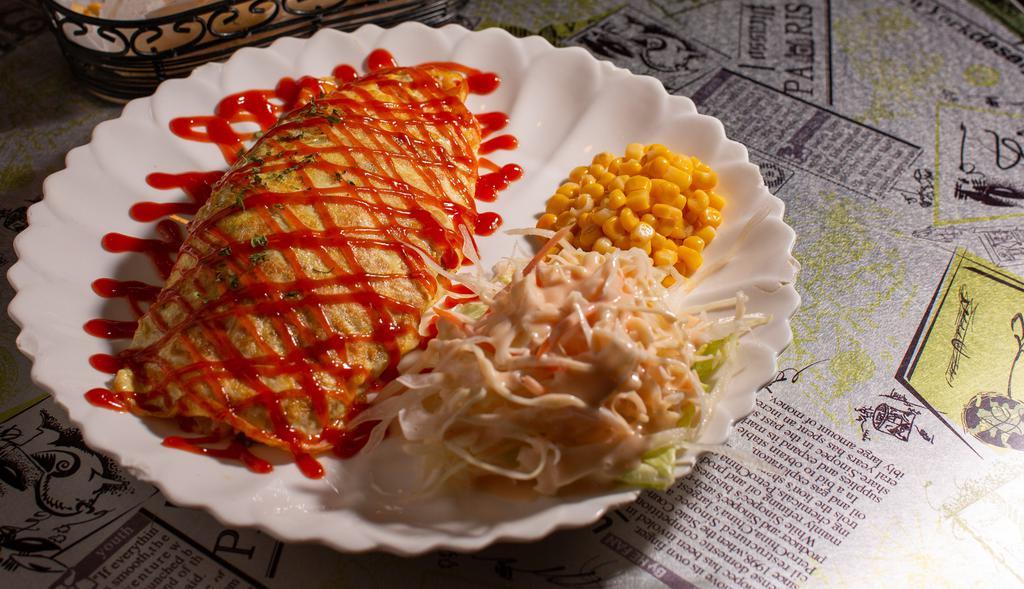 Omelet Rice · Stir vegetable fried rice with ketchup, and wrapped in a thin sheet of egg