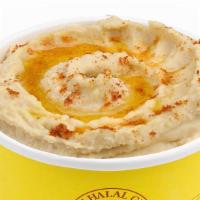 Hummus · The Mediterranean spread made from cooked, mashed chickpeas or other beans, blended with tah...