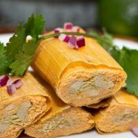 Chicken Tamales (3 Pieces) · Boneless chicken breast and thighs in a homemade mild green salsa and masa harina. Covered w...