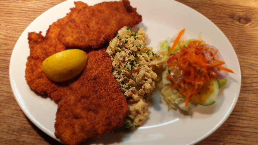 Chicken Schnitzel (Cutlet) · Chicken breaded cutlet with your choice of side.