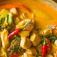 Panang Curry · Spicy panang curry cooked with coconut milk, bell pepper, green bean, pea-carrot and basil t...