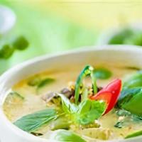 Green Curry · Green curry cooked with coconut milk, bamboo shoots, bell pepper, green bean, eggplant, carr...