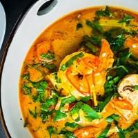 Tom Yum Soup (Hot & Sour Soup) · A spicy and sour mixture with Thai herbs, onion, tomato, carrot, mushroom, green onion, and ...