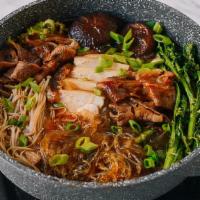 Sukiyaki (Thai Style Hot Pot Or Dry Sukiyaki) · Your choice of meat mixed with egg, Chinese cabbage or broccoli, celery, grass noodles, cila...
