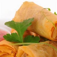 Spring Roll · A delicate combination of fresh veggies, glass noodles mixed with Thai herbs wrapped in a th...