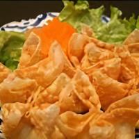 Crab Rangoon · Imitation crab, cream cheese mixed with herbs in a wonton wrapper deep fried. Served with pl...