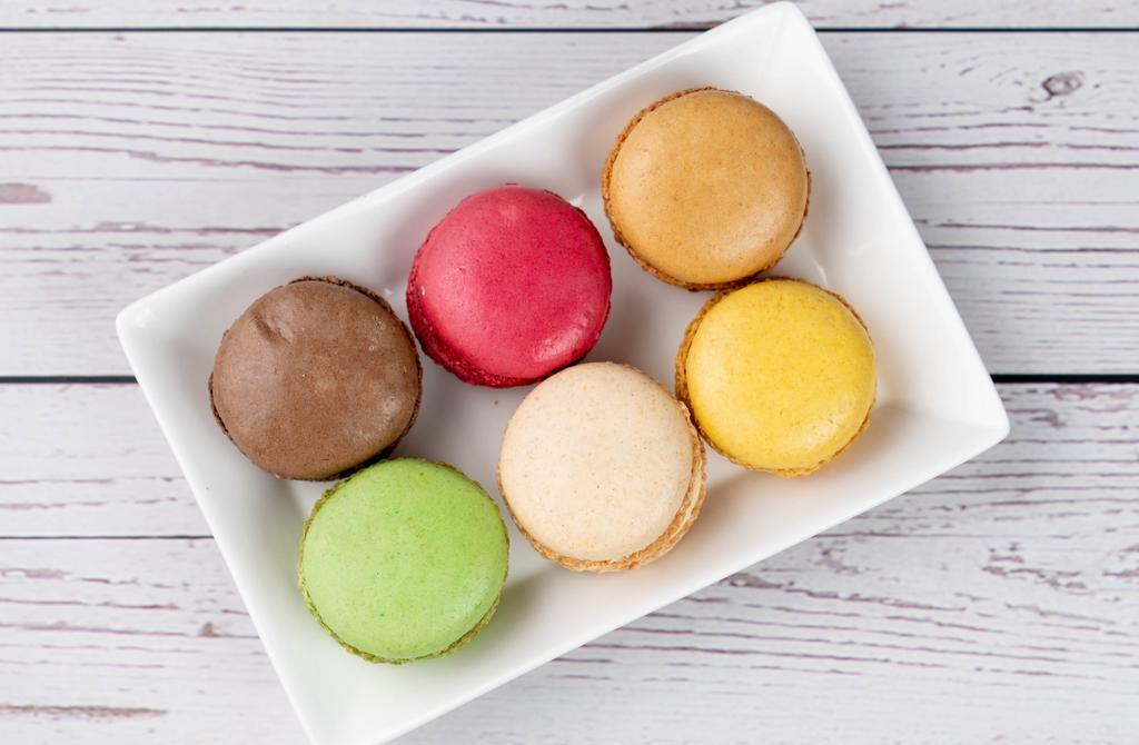 Macaron Collection · A set of 6 French style macarons: 
Vanilla, chocolate, caramel, raspberry,
lemon, pistachio