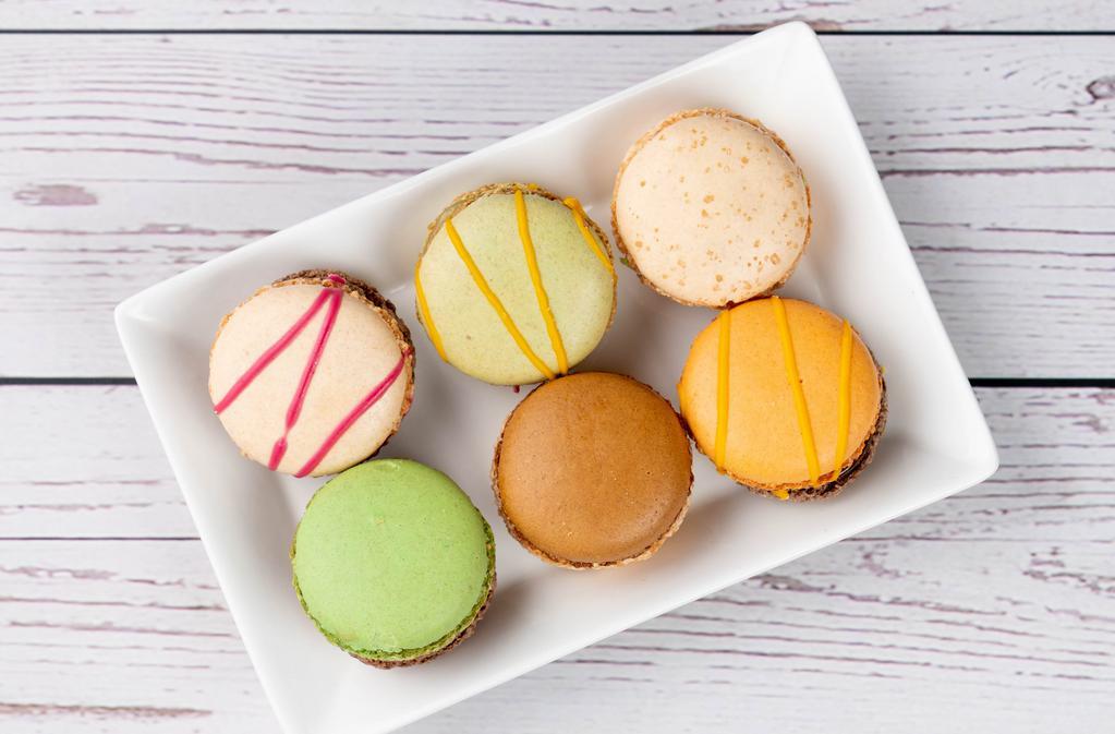 Fancy Macaron Collection · A set of 6 macarons: Tiramisu, Chocolate Mint, Chocolate Coconut, Lemon Yuzu, Creme Brûlée, Mango Passion.