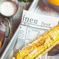 Grilled Corn With Cheese · With parmesan cheese, butter, and cajun seasoning.