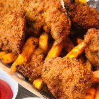 Chicken Nuggets Basket · Served with aside of Cajun fries.