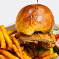 Fried Chicken Burger · Served with Cajun  fries.