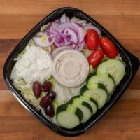 Greek Salad · Chopped romaine, red onion, cherry tomatoes, cucumbers, kalamata olives and our imported fet...
