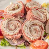 Large Chef'S Salad · Fresh turkey, roast beef, ham, Swiss cheese, hard boiled egg, mixed grens, onion and cucumber.