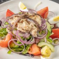 Large Blue Bay Salad · Individual can of tuna, hard boiled egg, anchovies, mixed greens, tomato, onion, peppers and...