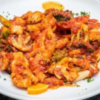 Chicken Fra Diavolo · Sauteed chicken breast with broccoli and mushrooms in a spicy red sauce.