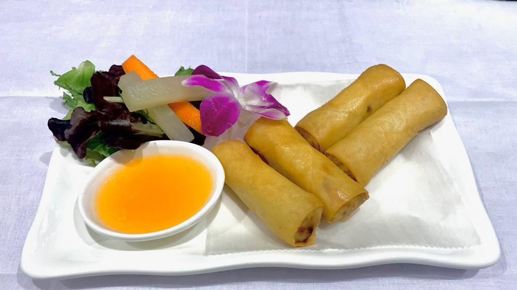 Spring Roll · Fried vegetable spring rolls served with sweet sauce.