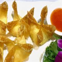 Crab Rangoon · Crispy Cream cheese , imitated crab meat, carrot , celery with sweet chili sauce .