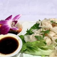 Veggie Dumpling · Steamed vegetable dumplings With sweet soy sauce.