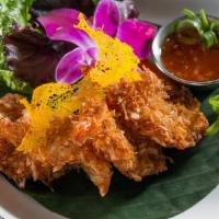 Fried Coconut Shrimp · Golden fried shrimp dipped in batter and coconut flake, sliced almond served with sweet chil...