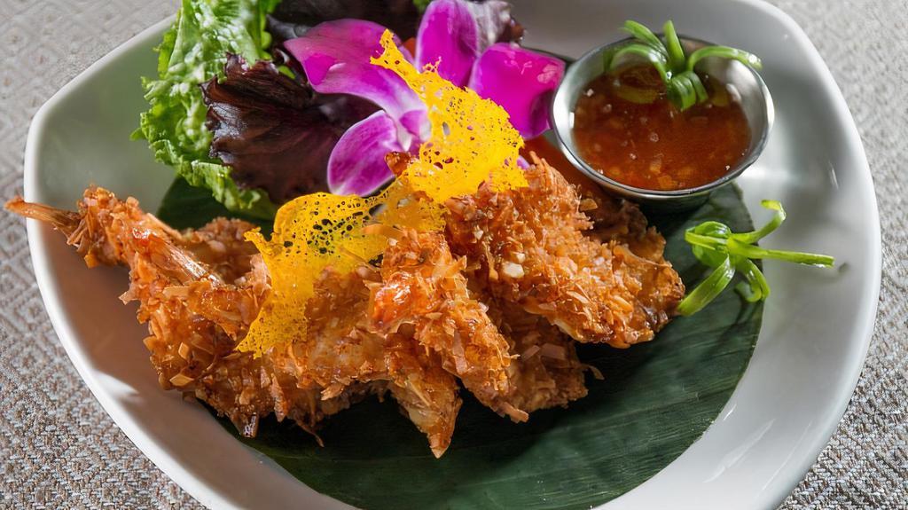 Fried Coconut Shrimp · Golden fried shrimp dipped in batter and coconut flake, sliced almond served with sweet chili sauce
