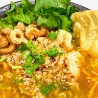 Tom Yum Noodle Soup** · Spicy rice noodle soup with Shrimp , bean sprout, peanut, scallion, cilantro and ground pork.