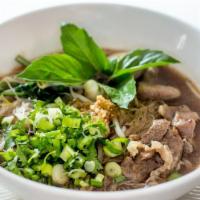 Boat Noodle (Beef Broth) · Thai style noodle with strong and very rich flavor with 2 hours stew beef shank as well as d...