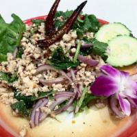 Larb Chicken ** · Ground chicken,shallots, mint, scallion, cilantro, roasted rice and chili powder in lime dre...