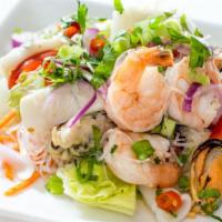 Yum Woon Sen** · Glass noodle salad w/mixed seafood, scallion, cilantro, chinese celery, cherry tomato, julie...
