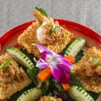 Larb Koog Tod (Fried Shrimp Salad)** · Classic fried golden shrimp, scallion, cilantro, roasted rice powder, lemon grass, lime leaf...