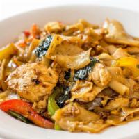 Pad Kee Mao (Spicy Noodle) · Flat rice noodle, egg, chili, basil and bell pepper in spicy chili sauce.