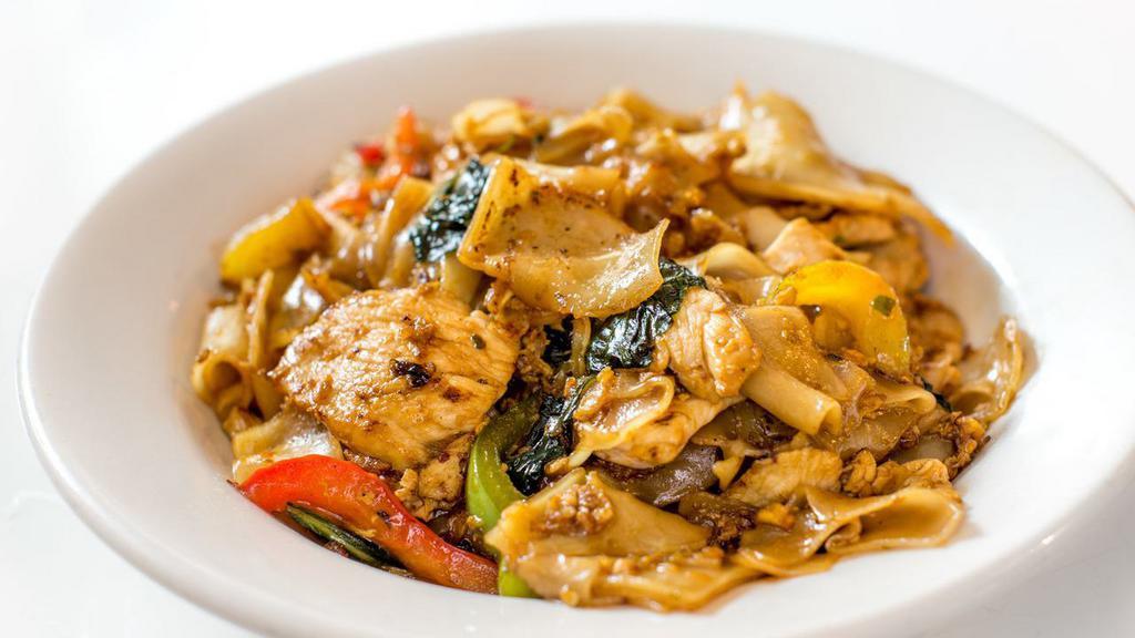 Pad Kee Mao (Spicy Noodle) · Flat rice noodle, egg, chili, basil and bell pepper in spicy chili sauce.