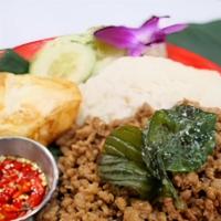 Kra Prow With Fried Egg  · Minced ground chicken, pork or beef with basil, garlic and chili.