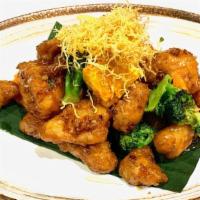 Orange Ginger Chicken(White Rice) · Stir-fried crispy chicken in a rich of orange ginger sauce/broccoli and topped w/crispy ginger