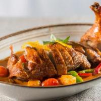 Roasted Duck Curry(White Rice) · The unique dish of Bangkok roast duck in a spicy pineapple red curry and combines with kaffi...