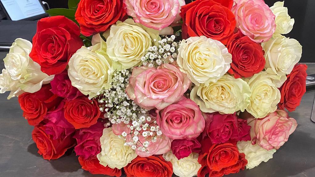 36 Assorted Roses Bouquet  · 36 Mix Roses, Orange, White and Pink Bouquet. 
Nothing speaks of love so much as a bouquet of beautiful long stem roses.