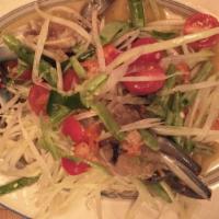 ***Green Papaya Salad · Spicy. Dried shrimp, tomato, peanut, long bean, Thai chili, lime juice. Sauce on the side.

...