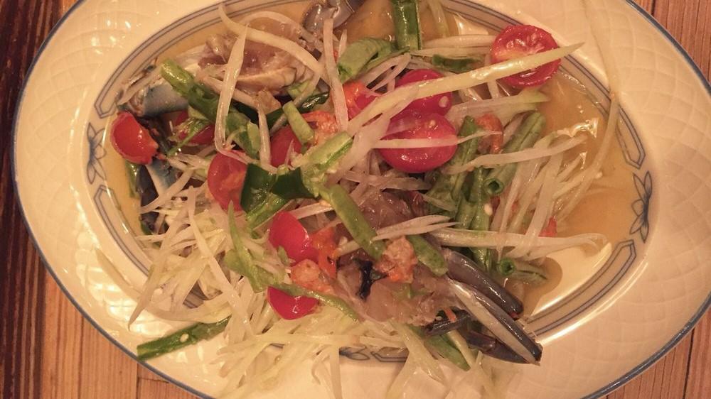 ***Green Papaya Salad · Spicy. Dried shrimp, tomato, peanut, long bean, Thai chili, lime juice. Sauce on the side.

Please Inform us of any allergies.
Gluten free. Contains fish sauce & shellfish.
Shellfish can be removed.