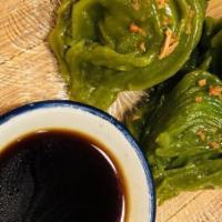 Steamed Vegetable Dumplings · Not spicy. Spinach, corn, tofu, peanuts, garlic chips, ginger soy dip.

Please Inform us of ...