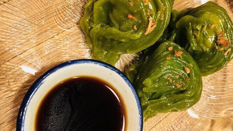Steamed Vegetable Dumplings · Not spicy. Spinach, corn, tofu, peanuts, garlic chips, ginger soy dip.

Please Inform us of any allergies.
Vegan. Contains gluten.